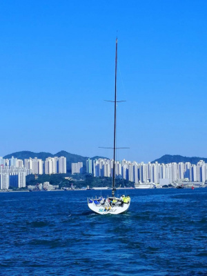 sailing in blue skies and blue sea