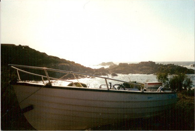 na brzegu